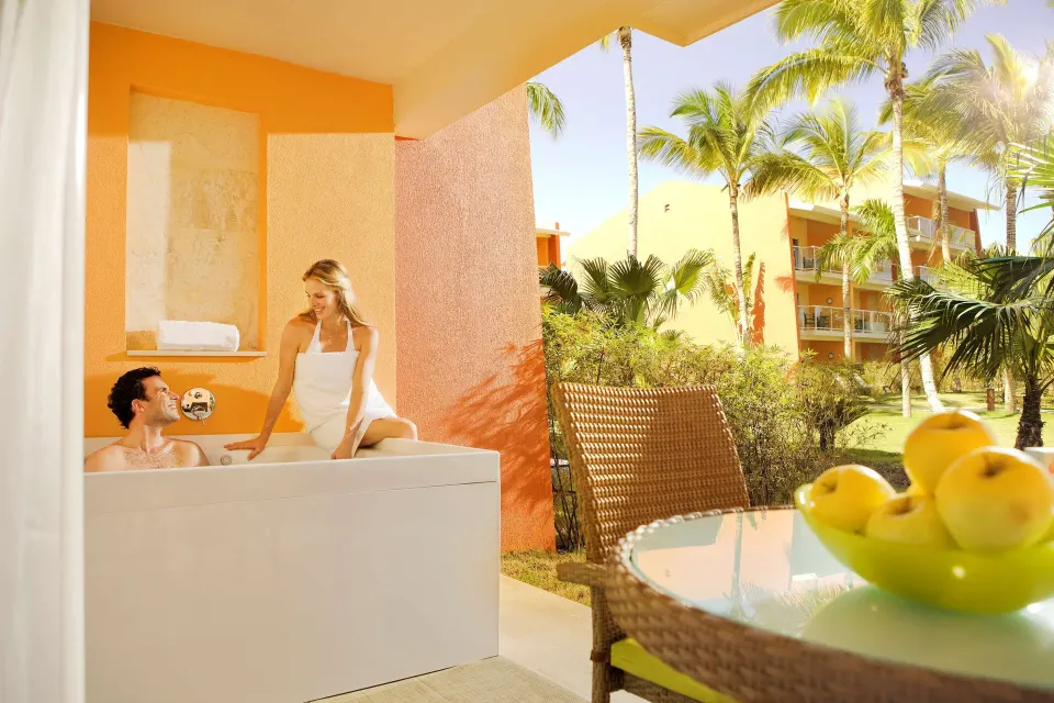 Family Room terrace whirlpool tub and seating area at Barceló Bávaro Palace.