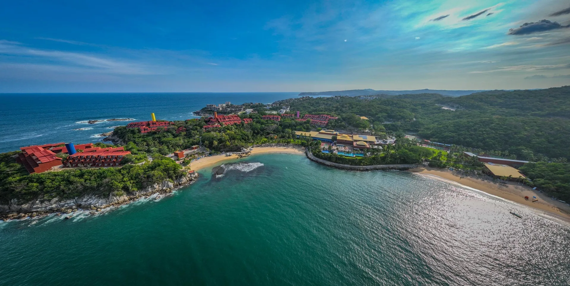 Las Brisas Huatulco expansive beachfront resort with multiple beaches and hillside ocean views