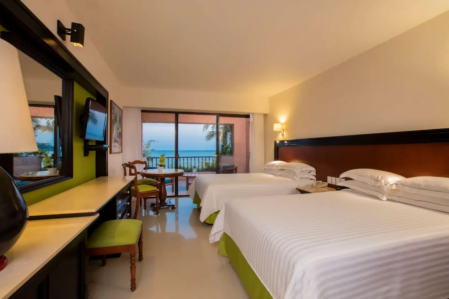 Deluxe Ocean View room with two beds facing the sea at Barceló Huatulco.
