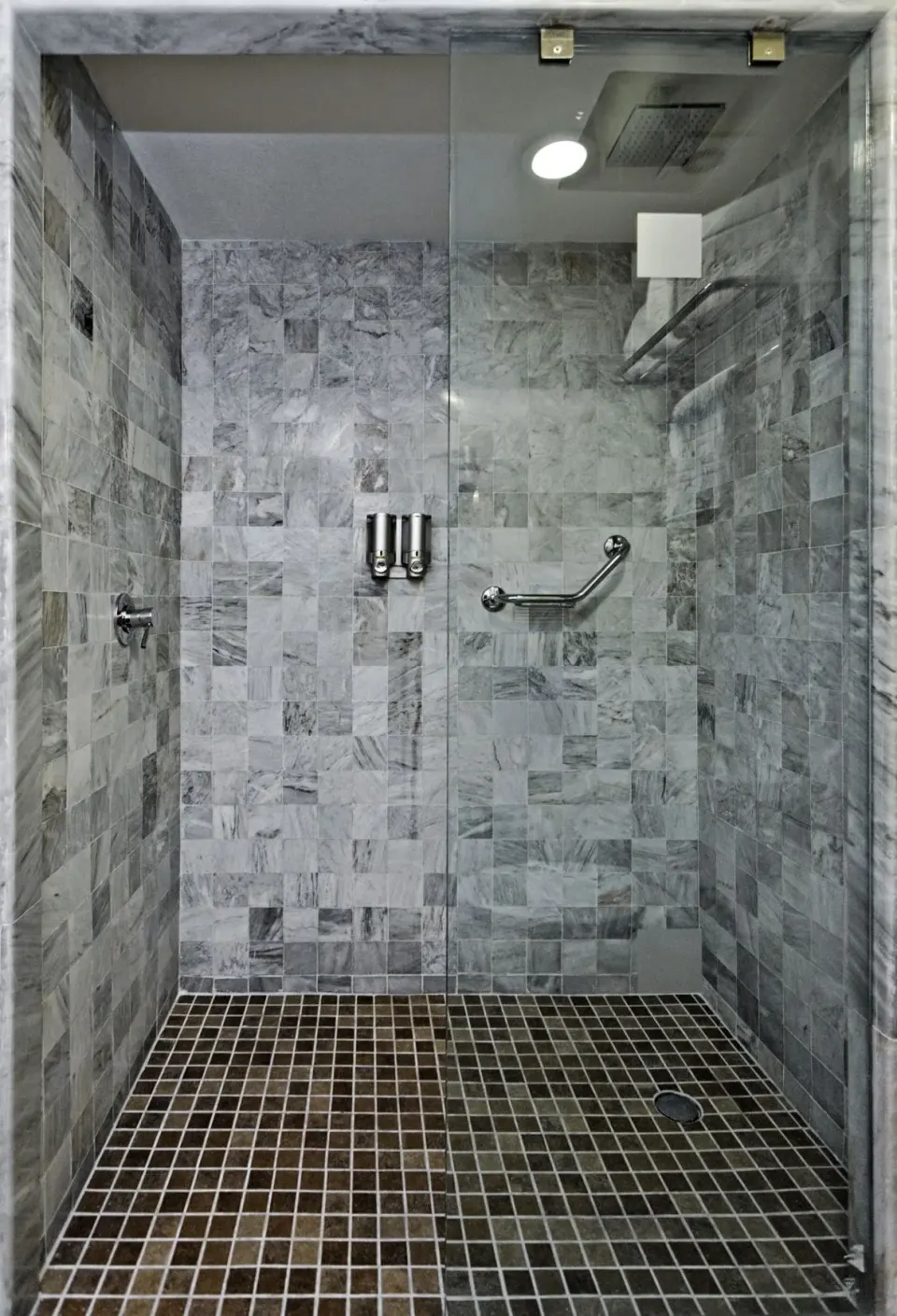Premium Level Sea Front View Deluxe Suite walk-in shower at Barceló Huatulco.