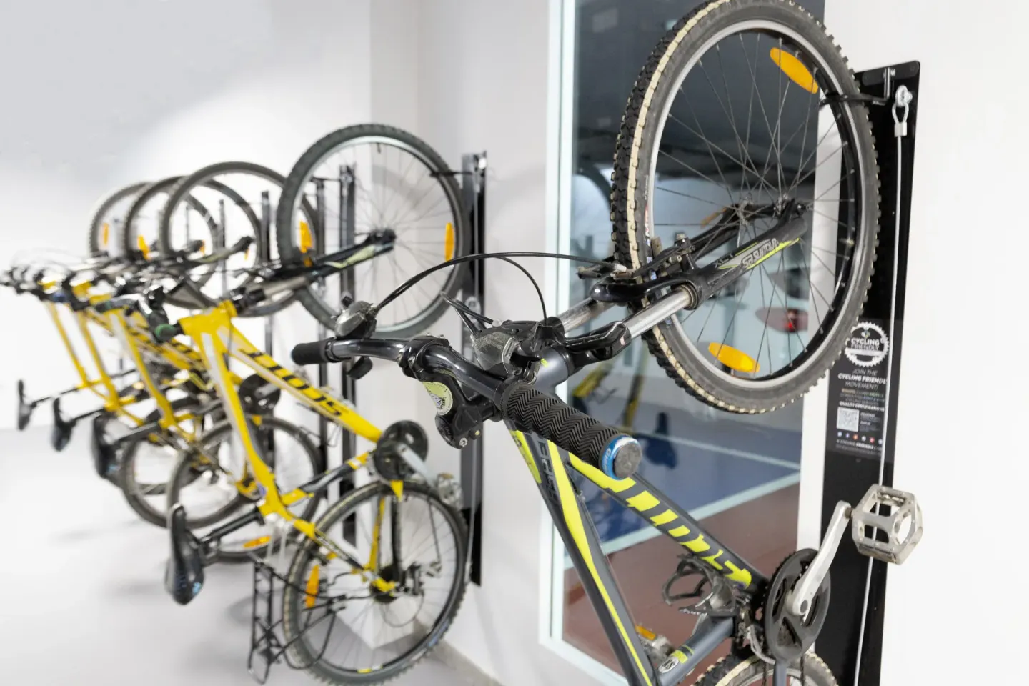 Bicycles are mounted on indoor racks at Barceló Ixtapa.