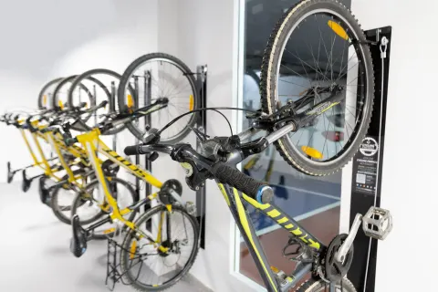 Bicycles are mounted on indoor racks at Barceló Ixtapa.