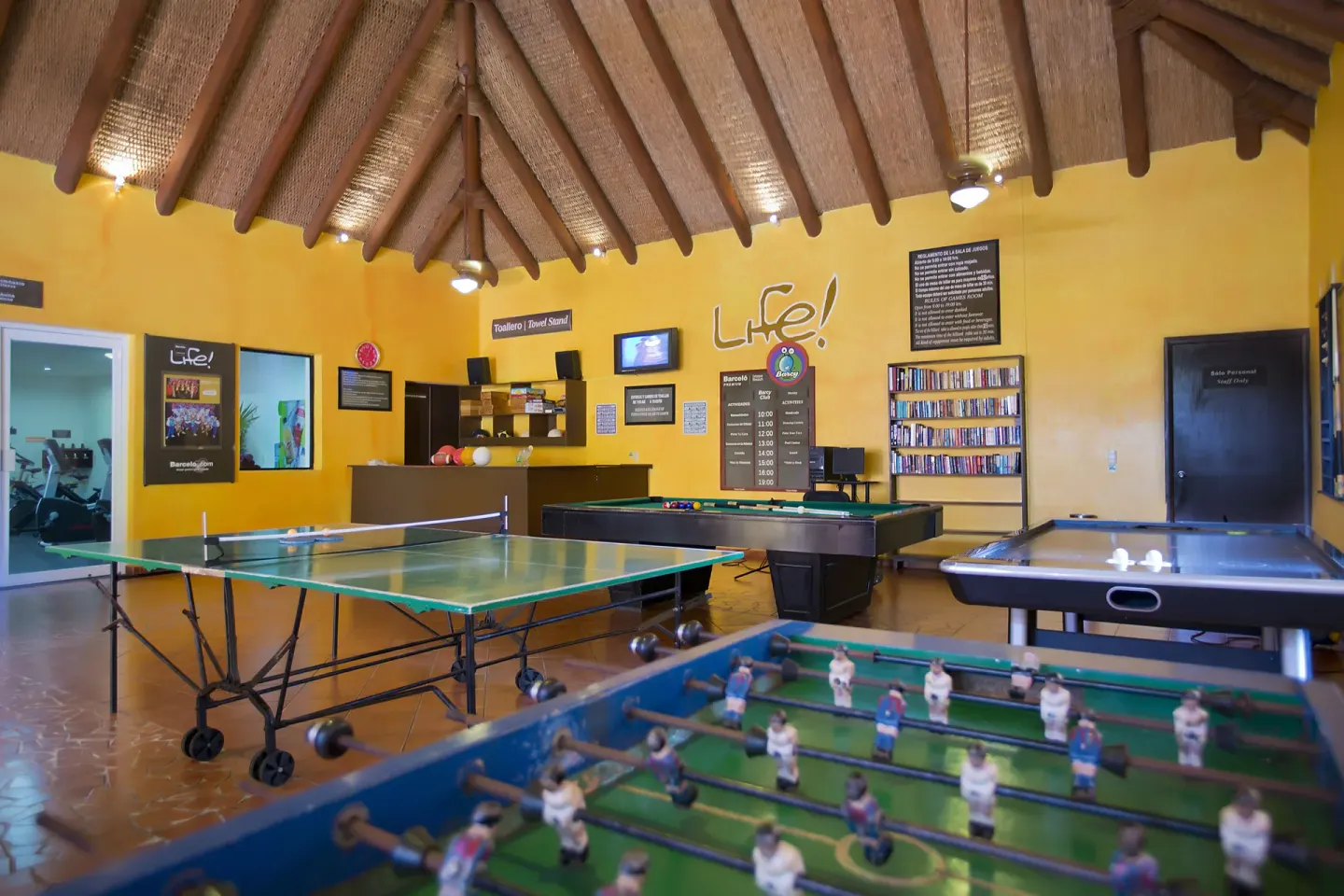 Game room with foosball, ping-pong, billiards, and air hockey at Barceló Ixtapa.