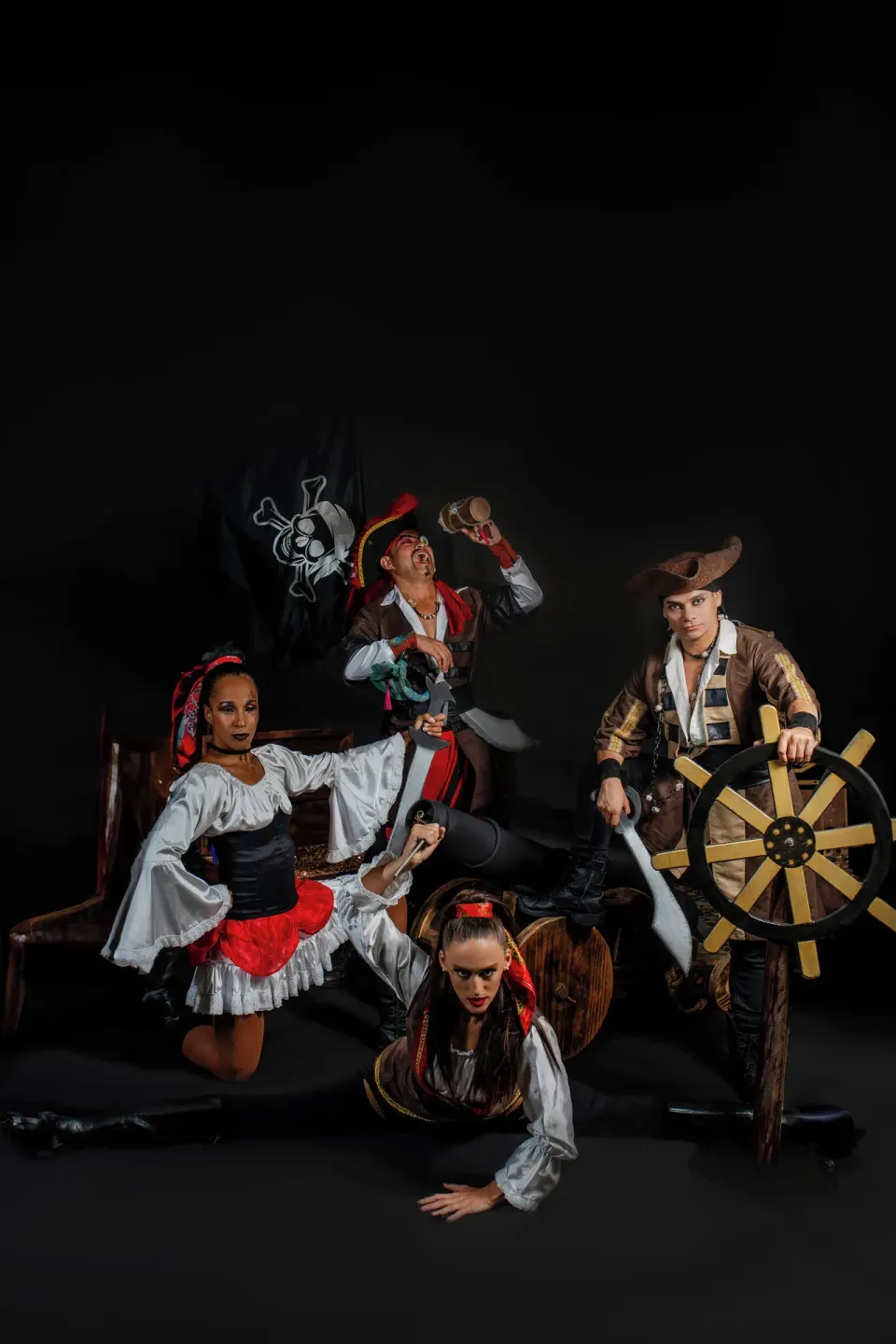 Pirate-costumed performers pose with props for entertainment at Barceló Ixtapa.