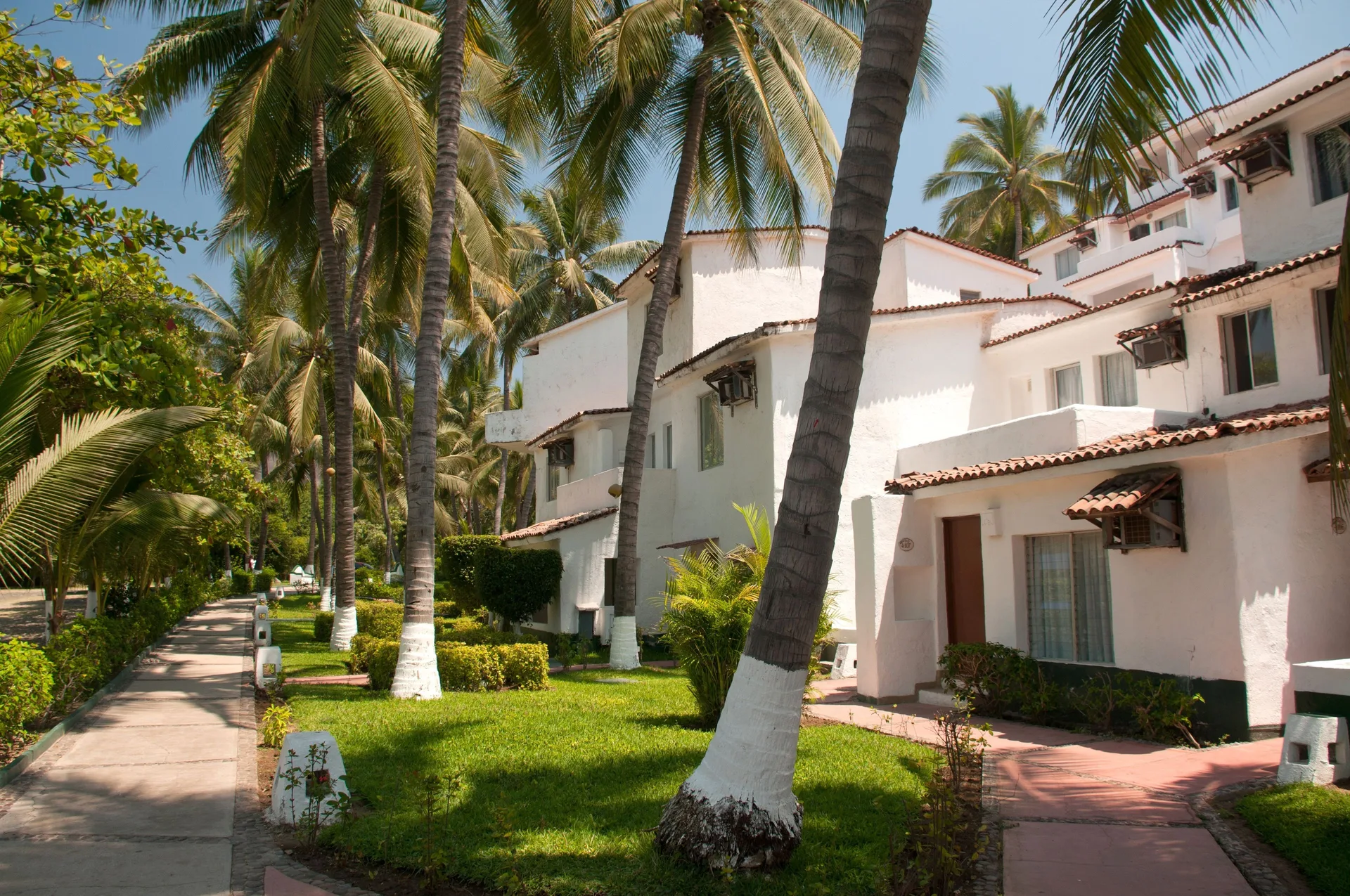 Vista Playa de Oro Manzanillo family resort near Santiago Bay with water park areas and casual activities