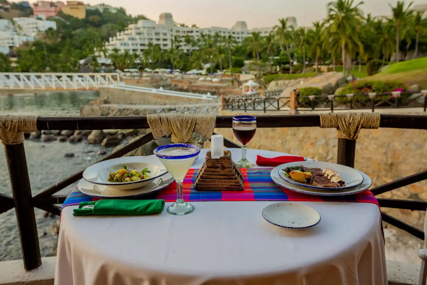 Waterfront table with Mexican-style dishes and drinks at Barceló Karmina.