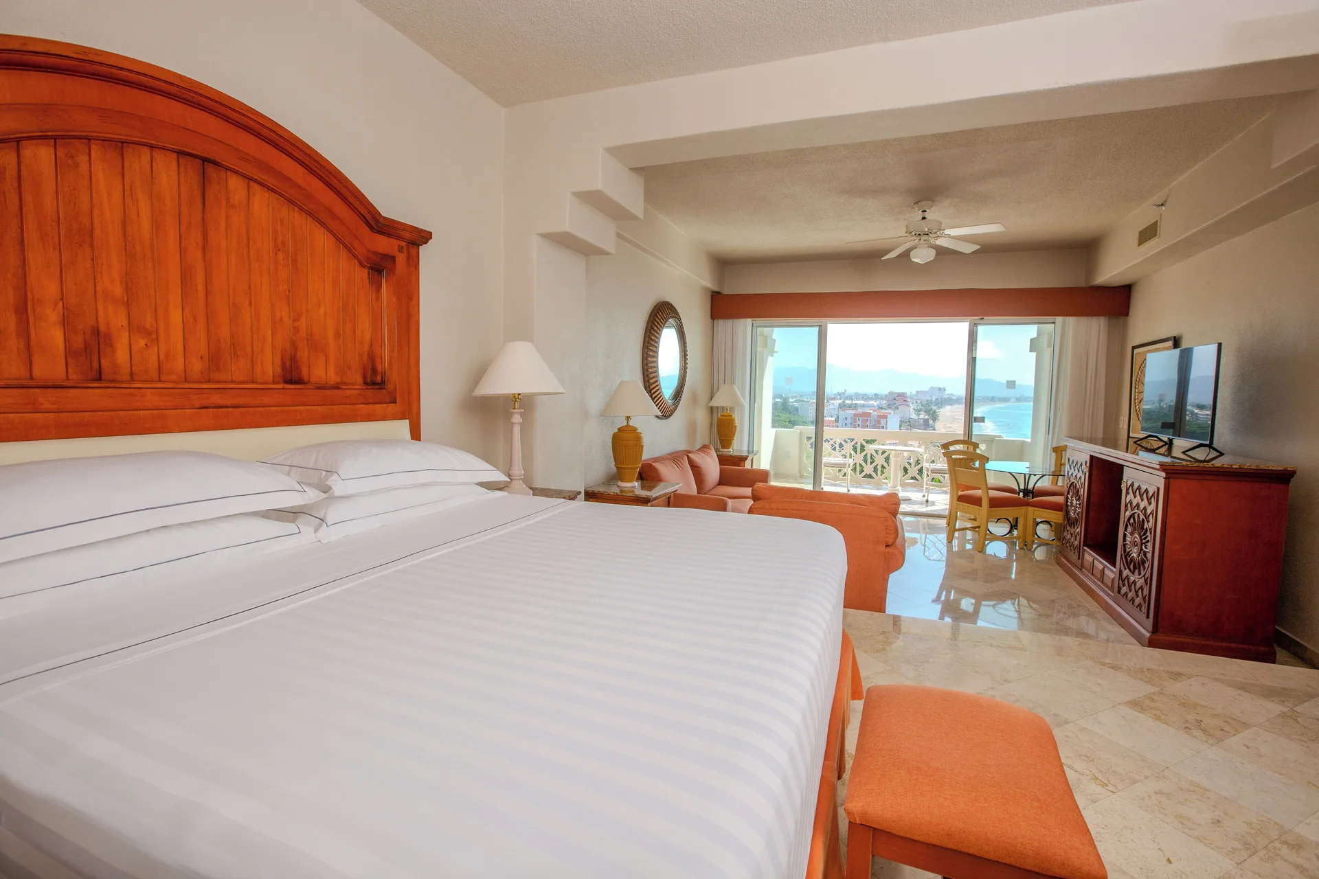 Junior Suite Premium Level with king bed and balcony at Barceló Karmina.