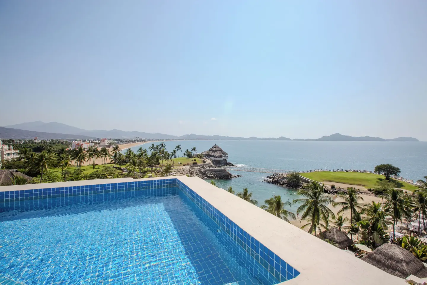 Private balcony pool overlooking the beach, palms and sea from a Master Suite at Barceló Karmina.