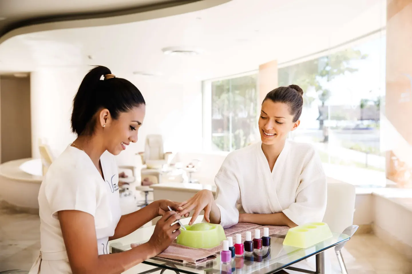 Manicure service at a bright spa nail station at Barceló Maya Caribe.