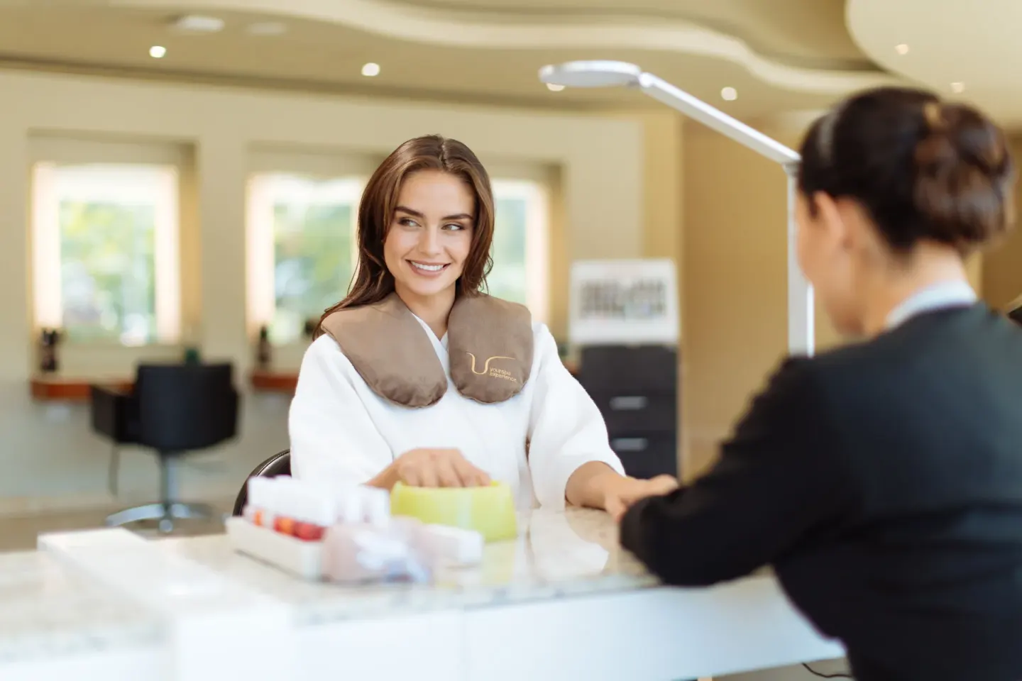 Guest receives a manicure at a salon station at Barceló Maya Riviera.