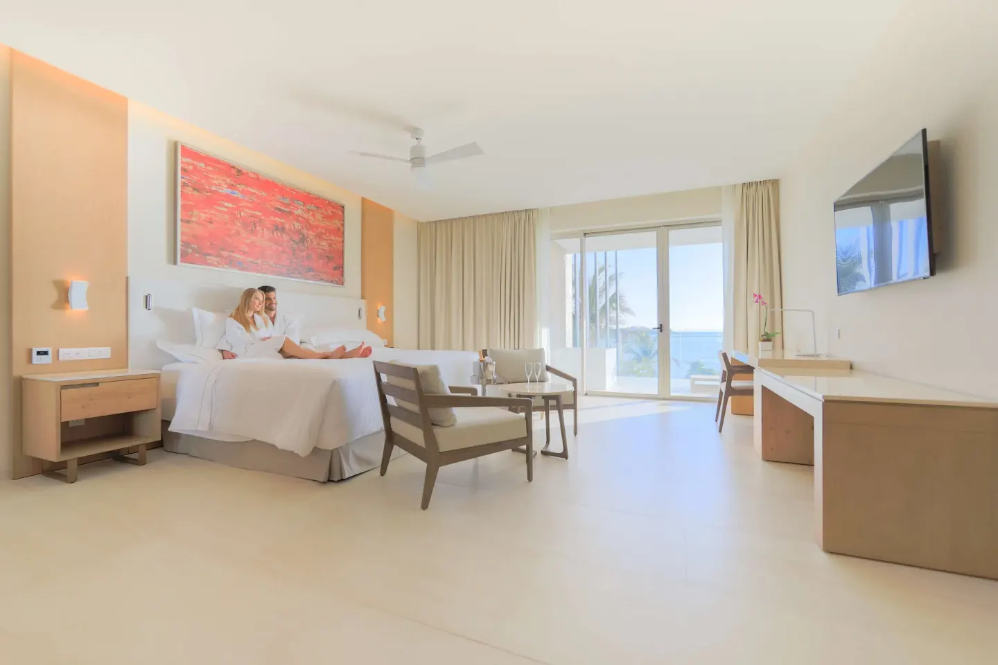 Junior Suite Oceanfront with king bed and sea-facing balcony at Barceló Maya Riviera.