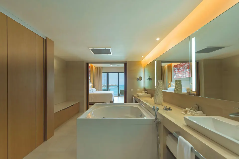 Presidential Suite oceanfront bathroom with soaking tub at Barceló Maya Riviera.