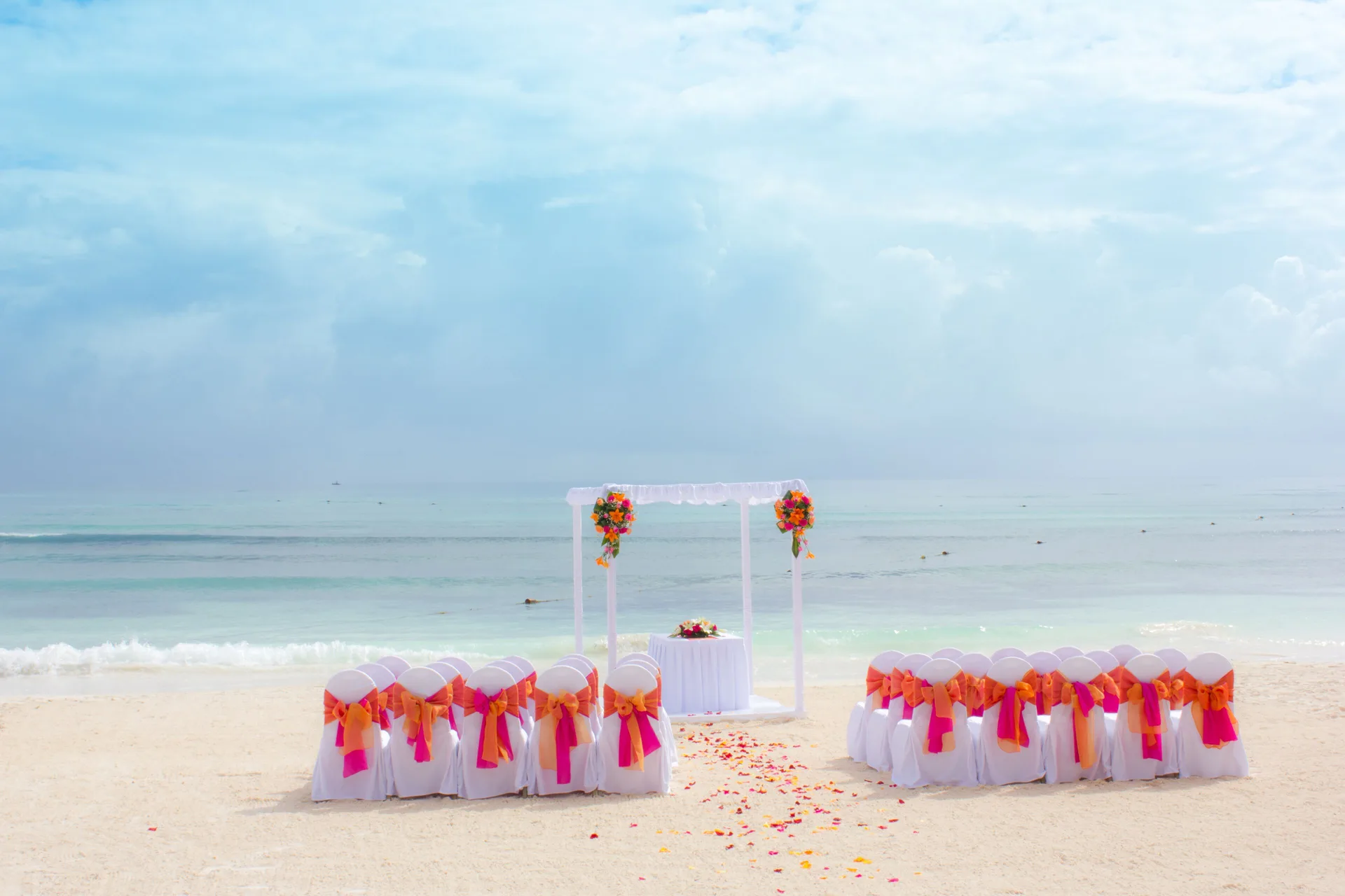 Beach wedding ceremony setup with ocean backdrop at Barceló Maya Riviera.