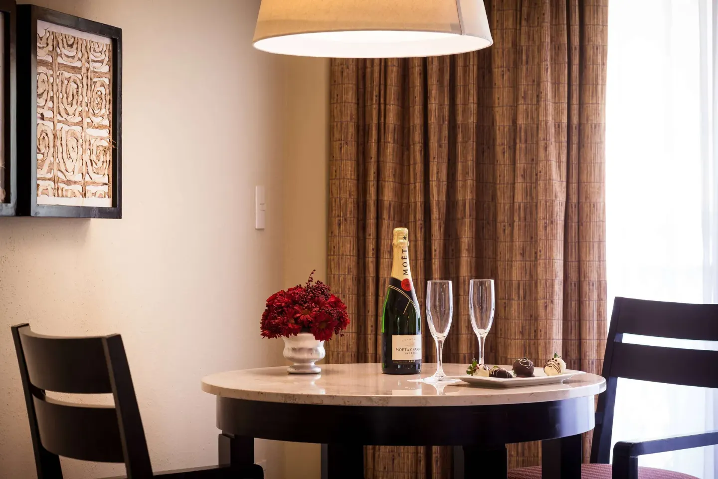 Deluxe Suite Premium Level dining table with sparkling wine at Barceló Puerto Vallarta.