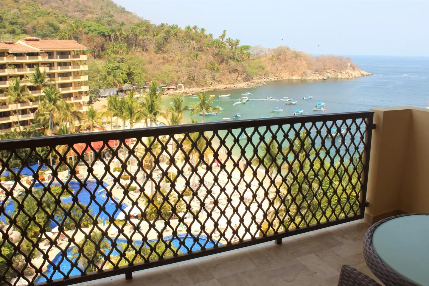 Family Room balcony with bay, beach, pools, and boats at Barceló Puerto Vallarta.