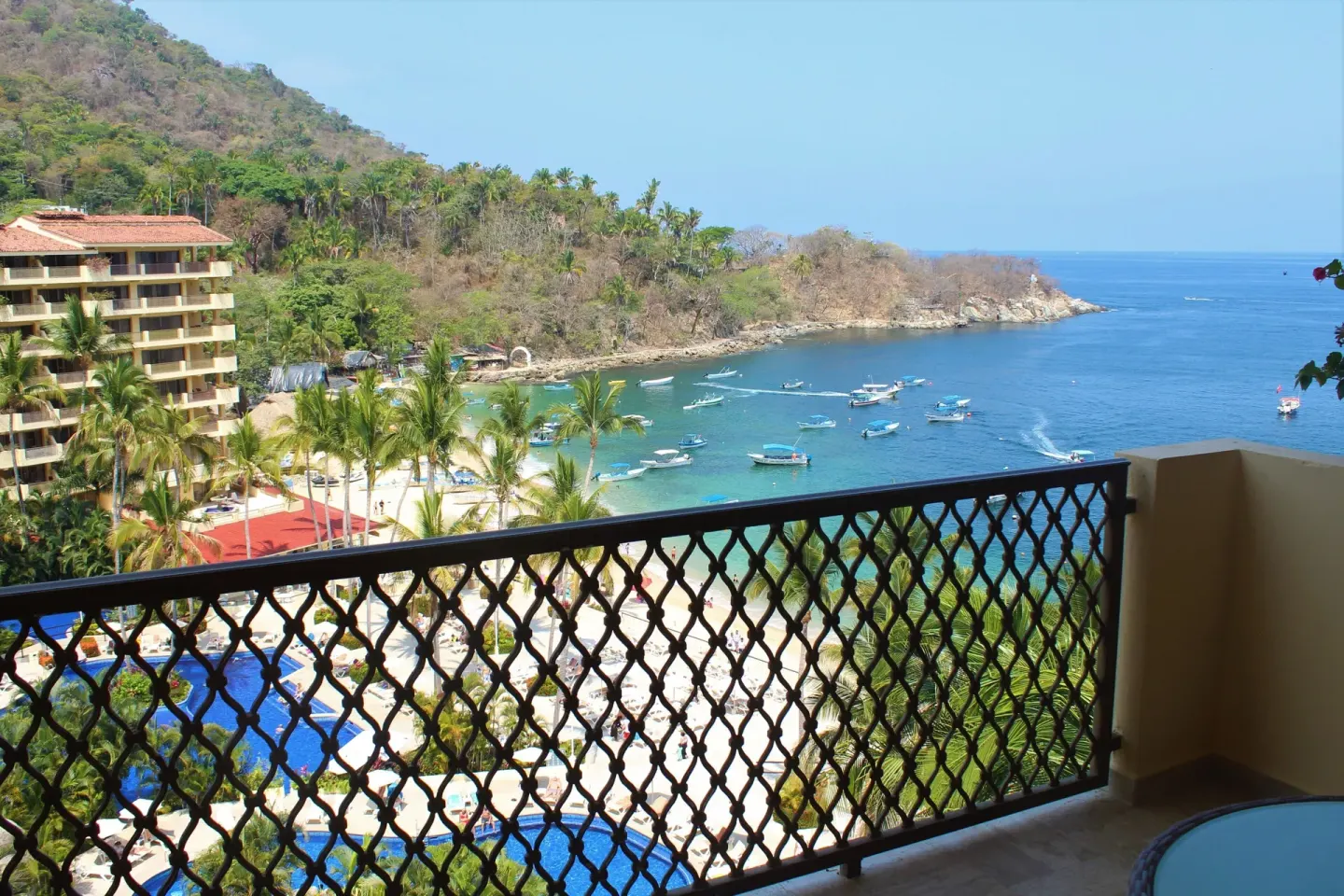 Family Room balcony view of the beach, bay, and boats at Barceló Puerto Vallarta.