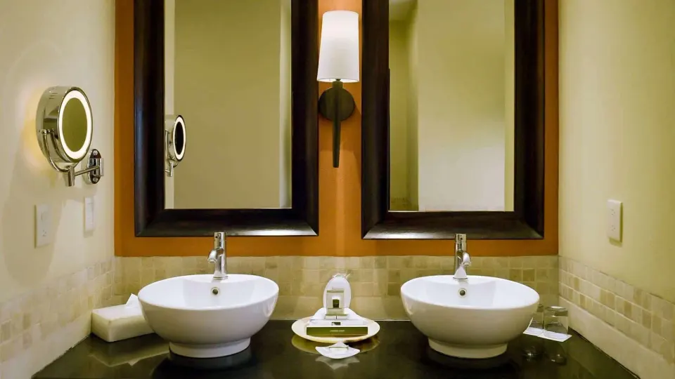 Grand Master Suite bathroom vanity with two vessel sinks at Barceló Puerto Vallarta.