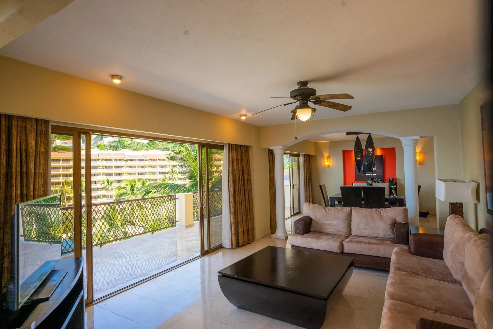 Presidential Suite Sea Front View Premium Level living and dining area at Barceló Puerto Vallarta with elegant furnishings and panoramic views of Banderas Bay.
