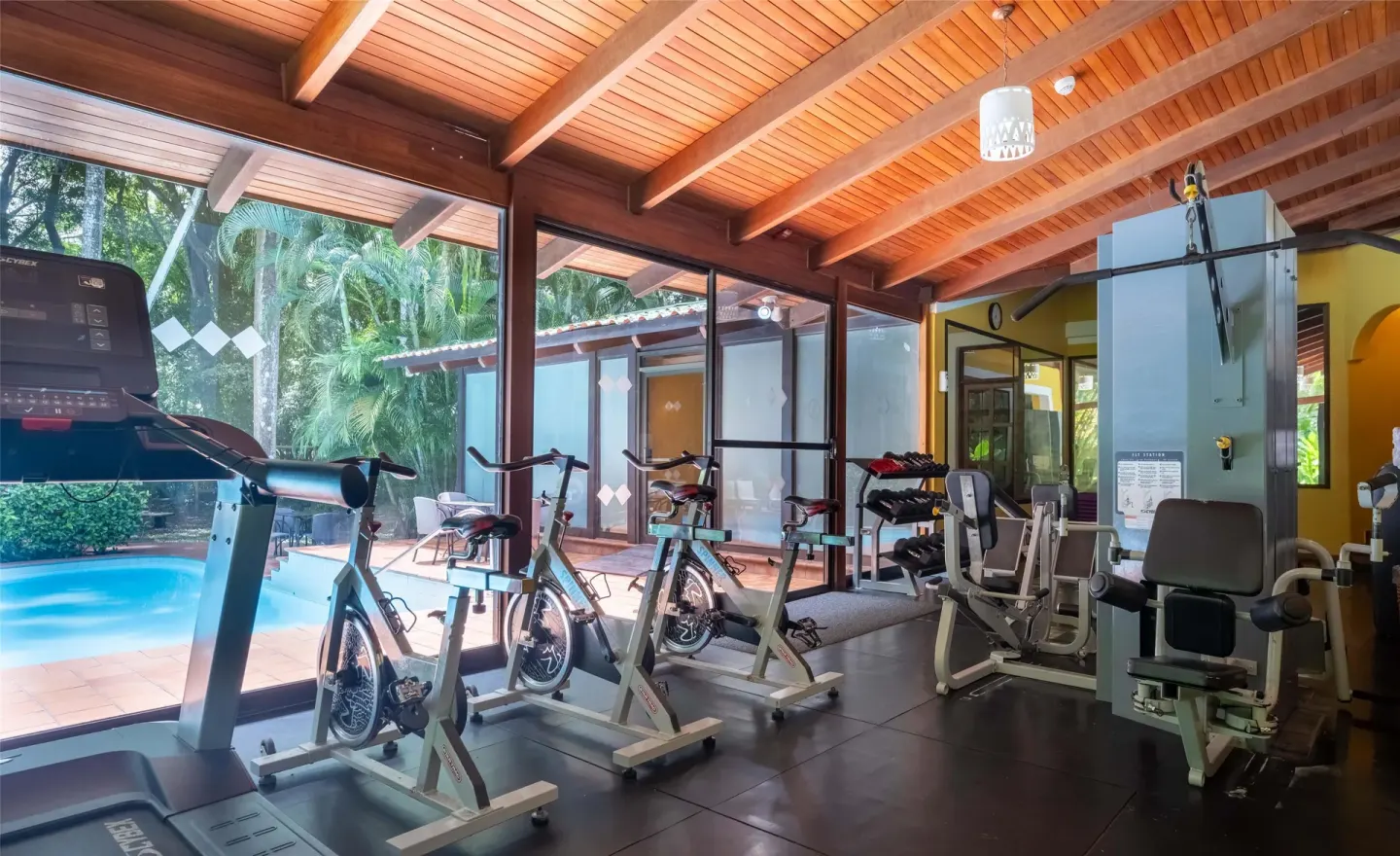 Gym with treadmill, spin bikes, and strength equipment at Barceló Tambor.