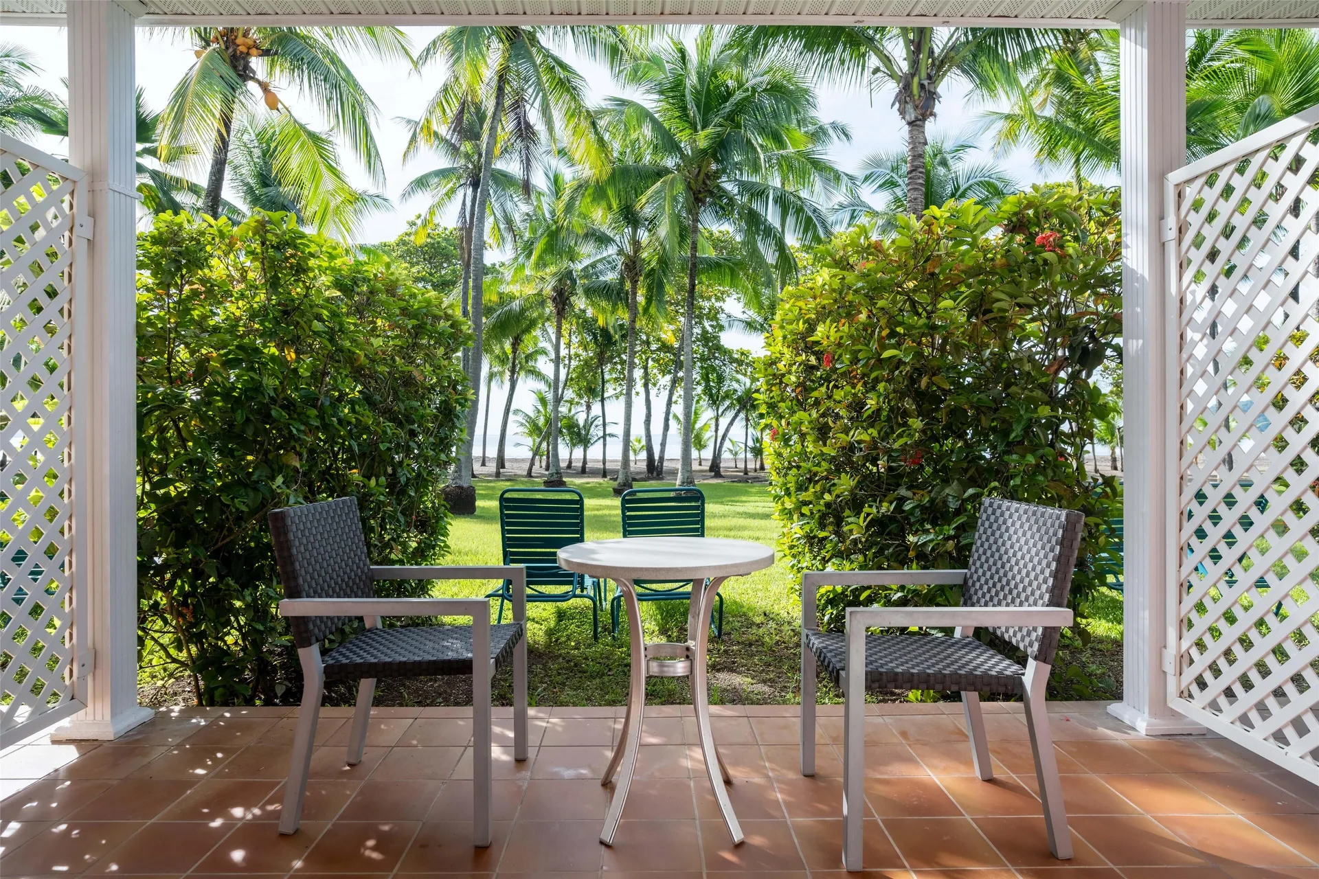 Premium Superior room patio with table and garden view at Barceló Tambor.