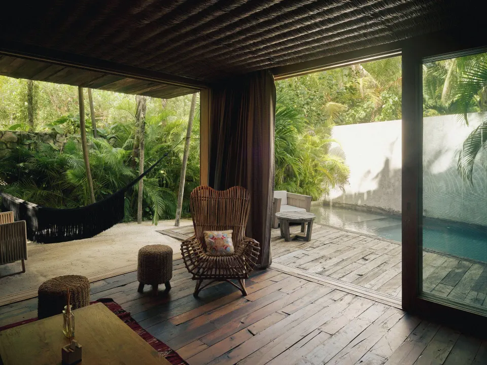 Covered deck with hammock and private plunge pool at BE Destination Tulum