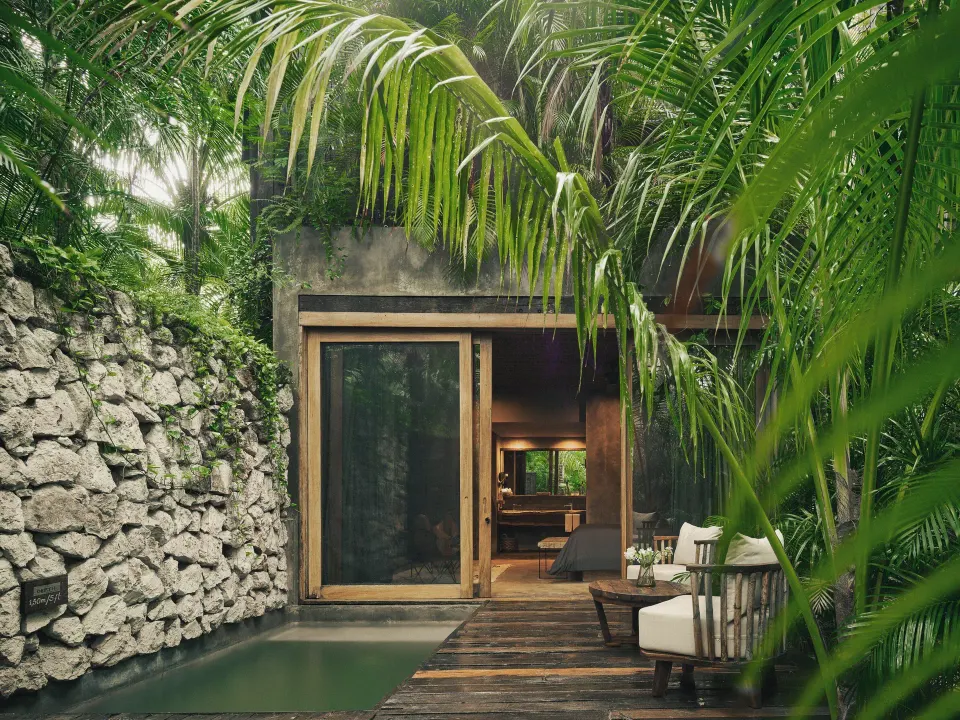 Private plunge pool and deck outside a villa at BE Destination Tulum