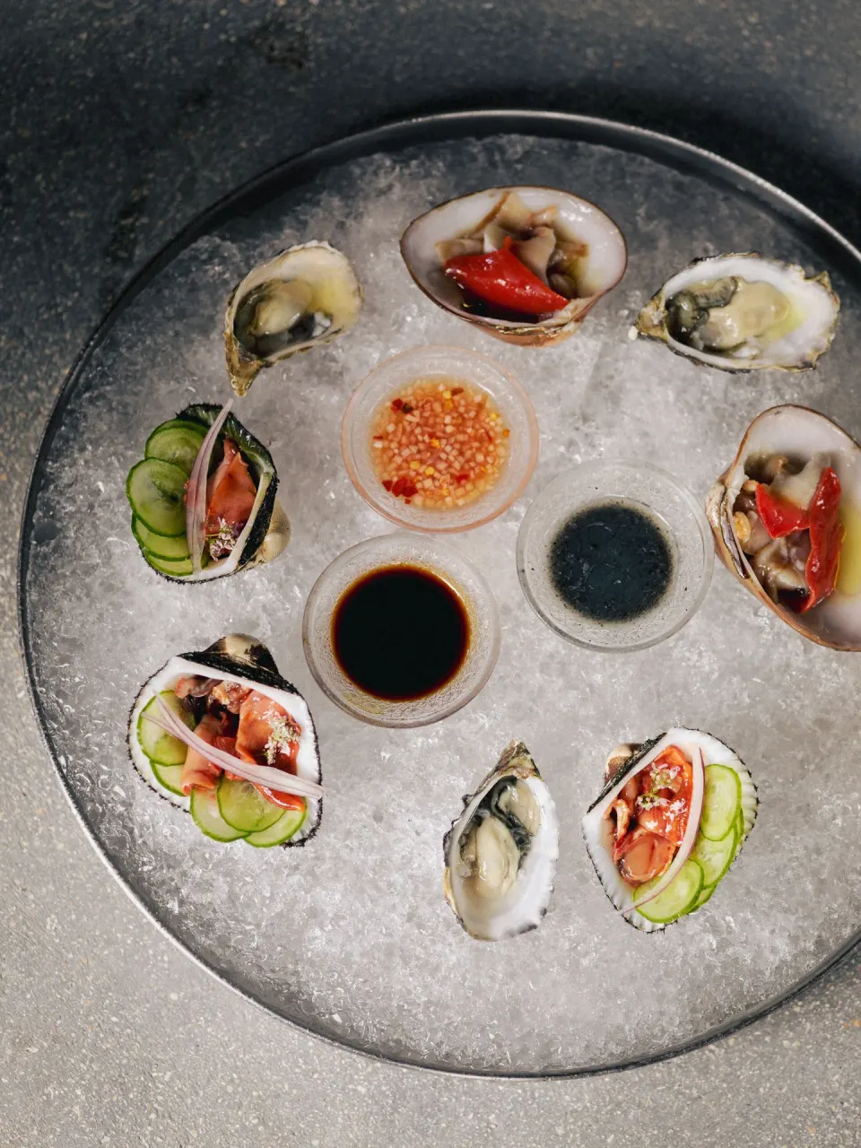 Oyster platter on ice with three sauces at BE Destination Tulum