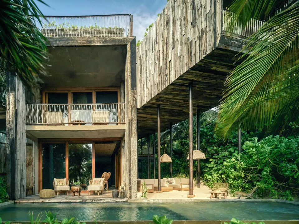 Exterior of oceanfront suite with plunge pool and deck at BE Destination Tulum