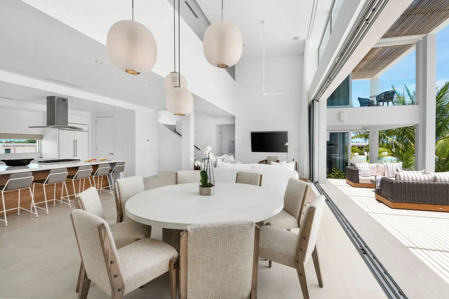 Open dining and living area in a Grace Bay ocean view villa at Beach Enclave.