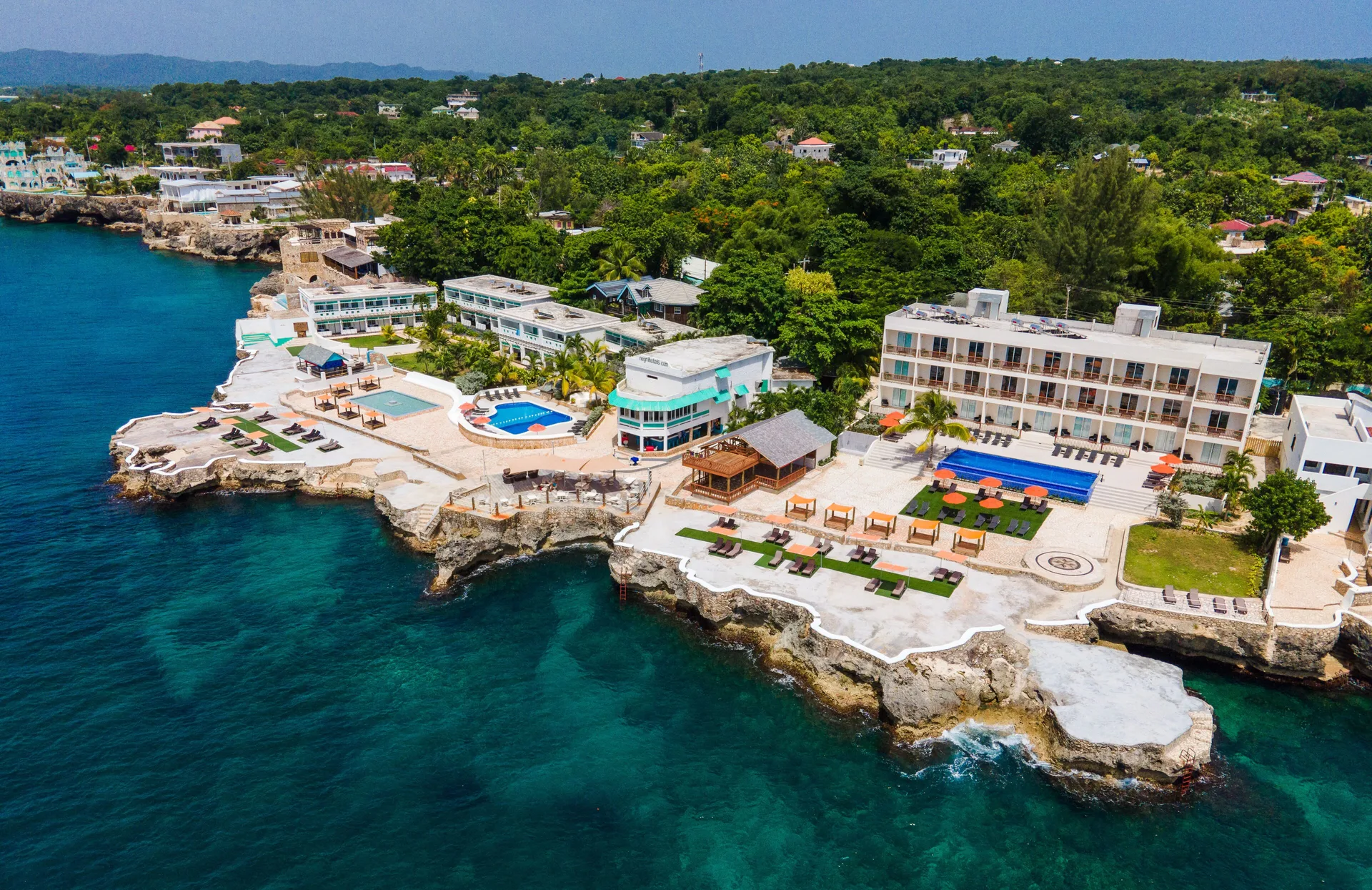 Samsara Cliff Resort oceanfront cliff hotel with casual atmosphere and West End views