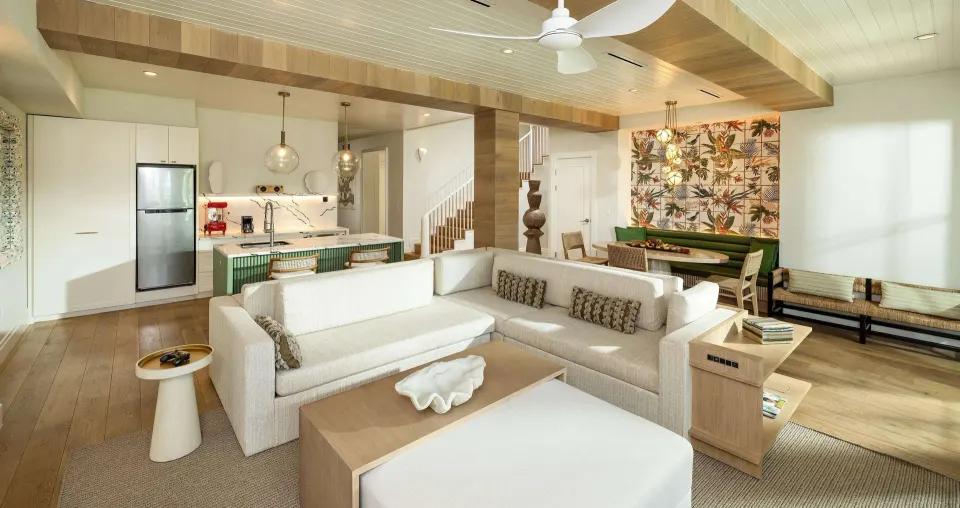 Open living, dining, and kitchen area in Firesky Reserve Villa at Beaches Negril Resort.