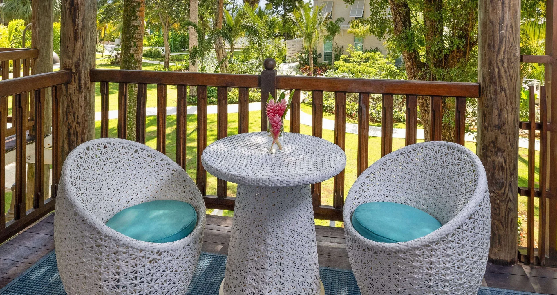 Tropical Butler Family Suite balcony seating at Beaches Negril Resort.
