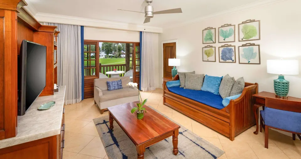 Tropical Concierge Family Room living area with sofa beds at Beaches Negril Resort.