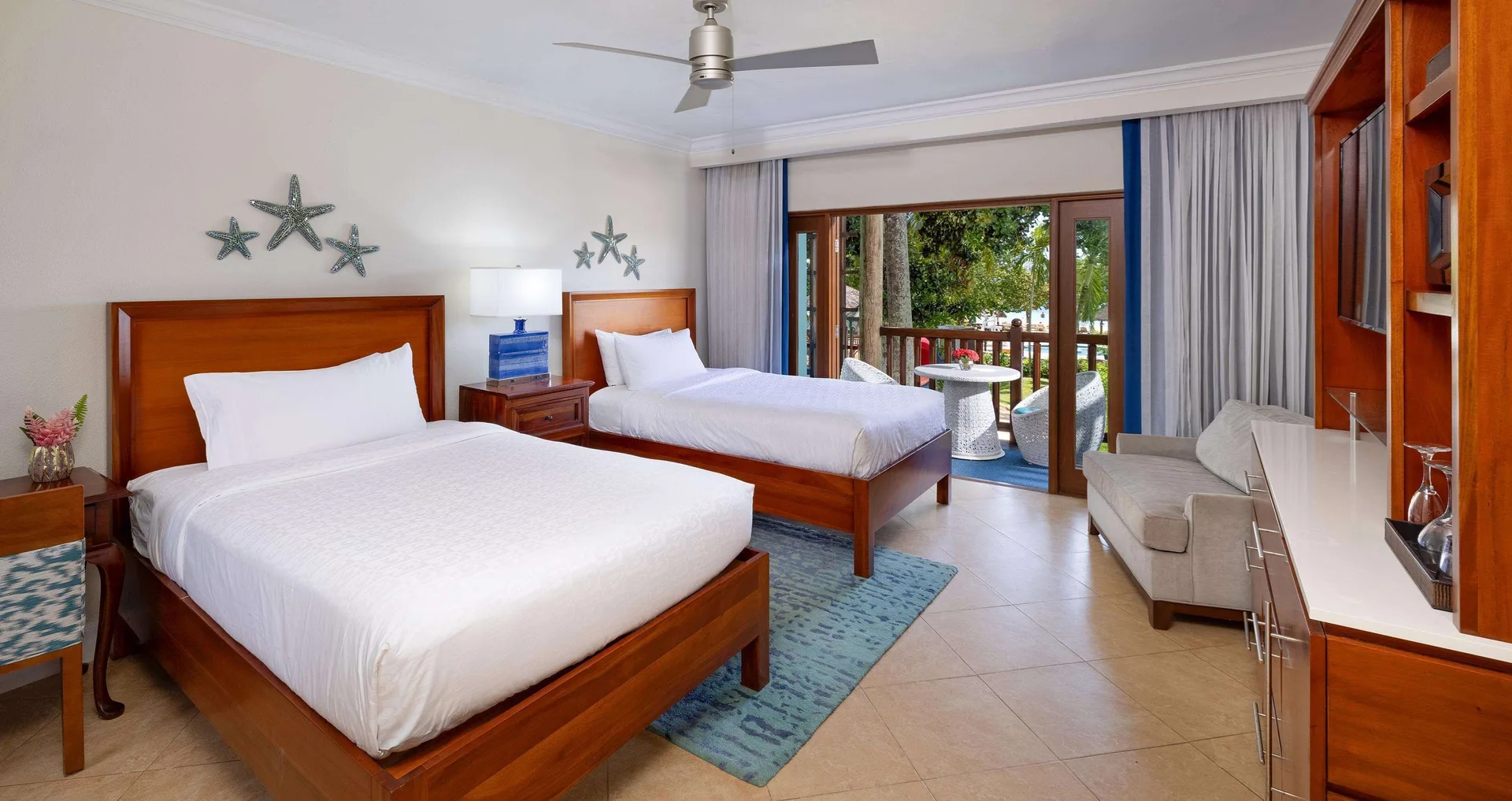 Tropical Oceanview Concierge double-bed room with balcony at Beaches Negril Resort.
