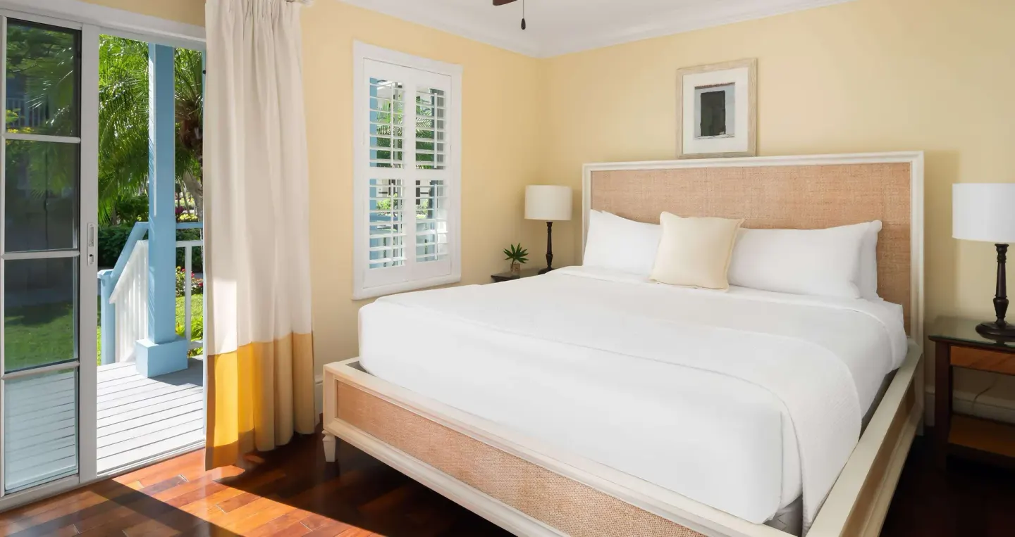 King bedroom with garden porch access at Beaches Turks & Caicos.