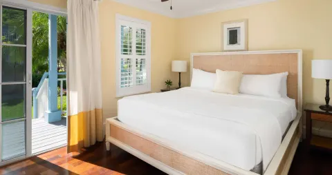 King bedroom with garden porch access at Beaches Turks & Caicos.