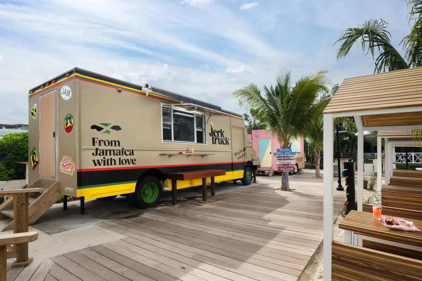 Jamaican jerk food truck on a wooden deck at Beaches Turks & Caicos.