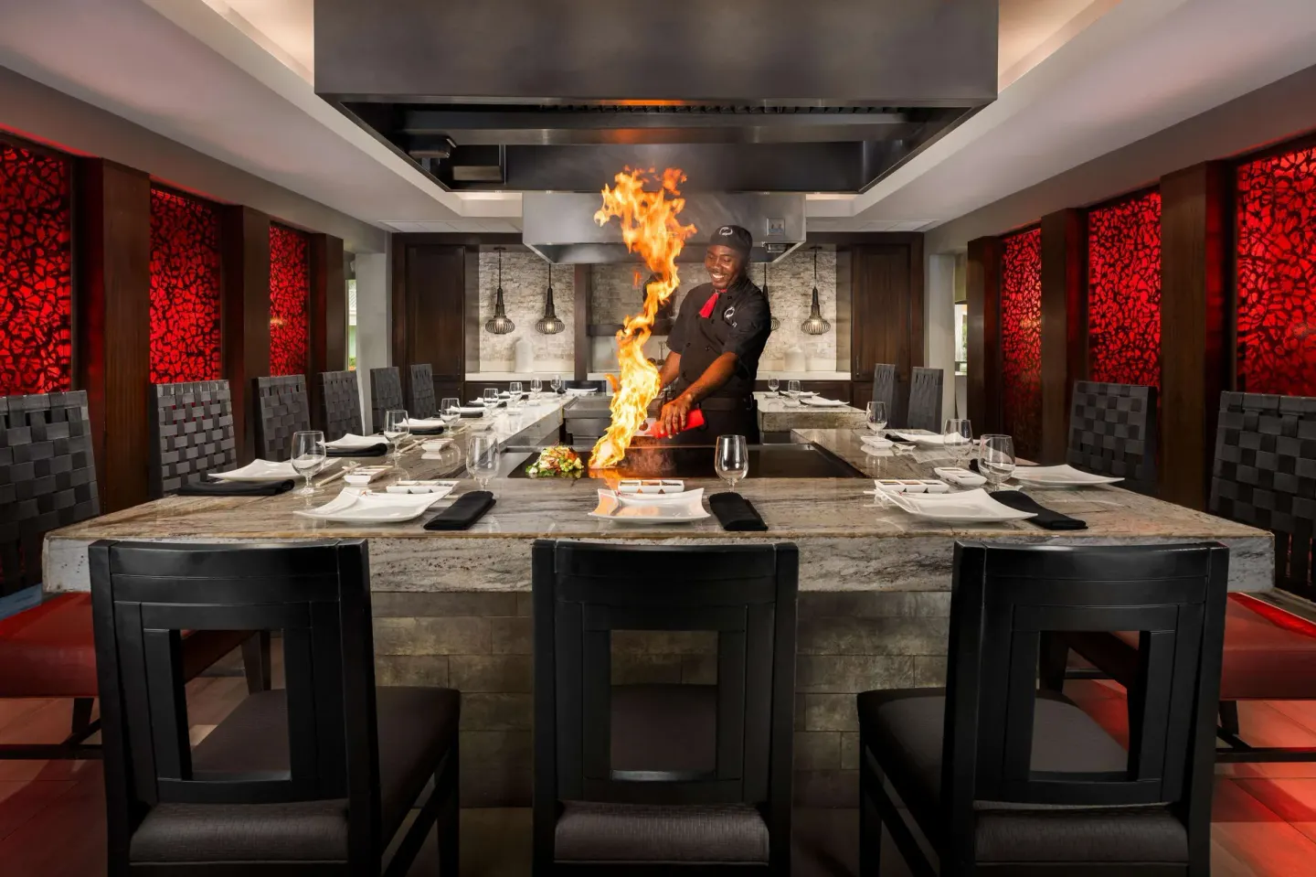 Teppanyaki chef cooking with flames at Kimonos at Beaches Turks & Caicos.