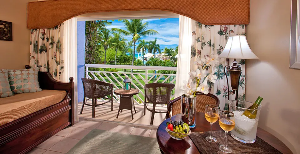 Caribbean Honeymoon Luxury Concierge Suite sitting area and balcony at Beaches Turks & Caicos.