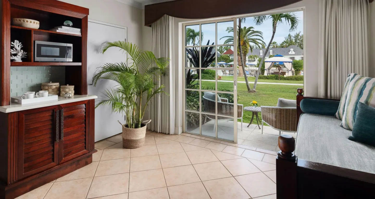 Walkout sitting area and garden patio in a Luxury Room at Beaches Turks & Caicos.