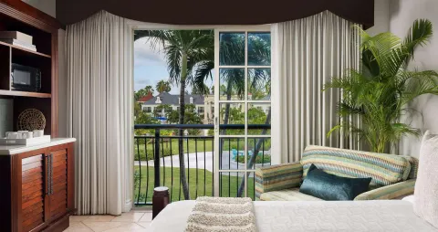 Luxury Room Garden View balcony scene from the bed at Beaches Turks & Caicos.