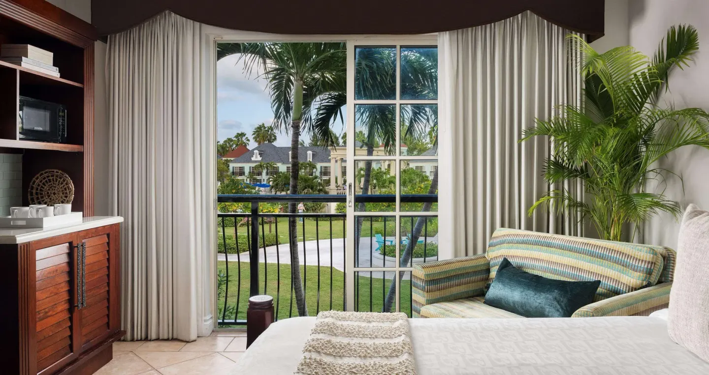 Luxury Room Garden View sitting area and balcony at Beaches Turks & Caicos.