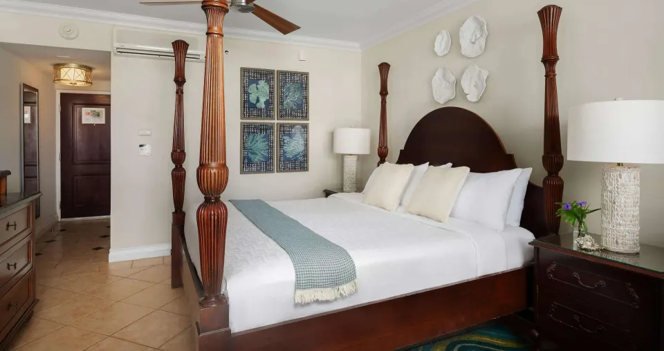 Standard room with king four-poster bed at Beaches Turks & Caicos.