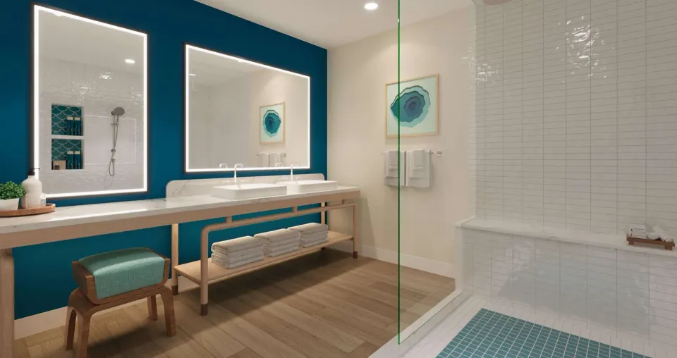 Treasure Beach Concierge suite bathroom with double vanity and shower at Beaches Turks & Caicos.