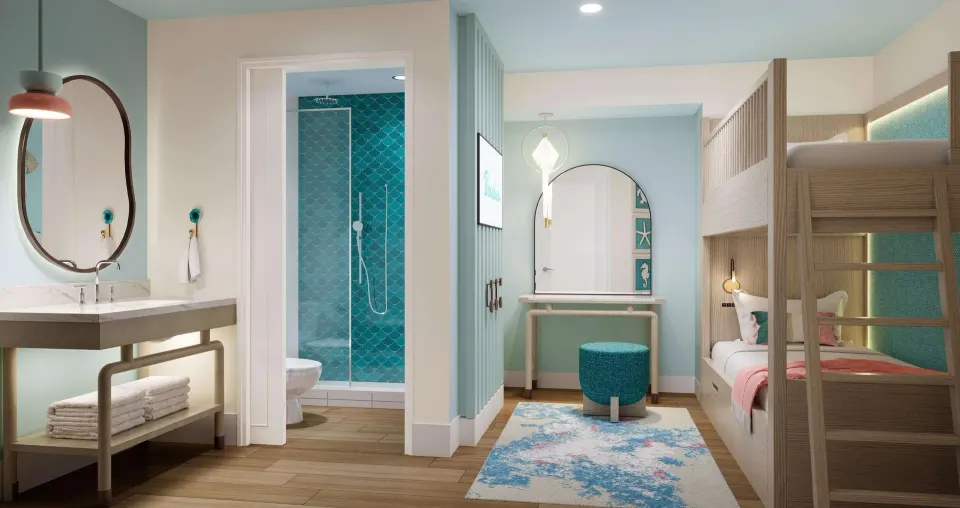 Bunk beds, vanity, and shower entrance in a suite at Beaches Turks & Caicos.