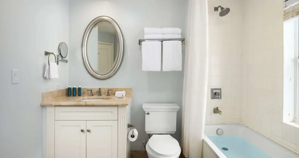 Garden view suite bathroom with tub and vanity at Beaches Turks & Caicos.