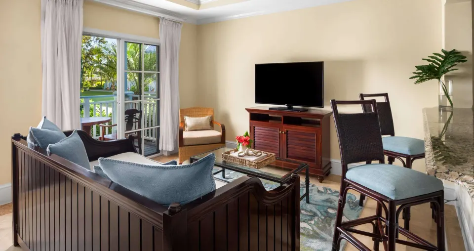 Garden view suite living room with balcony at Beaches Turks & Caicos.