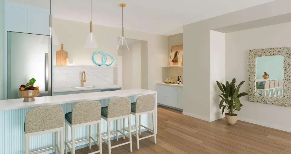 Suite kitchen and bar area at Beaches Turks & Caicos with stools, pendant lights, and pale blue cabinetry.