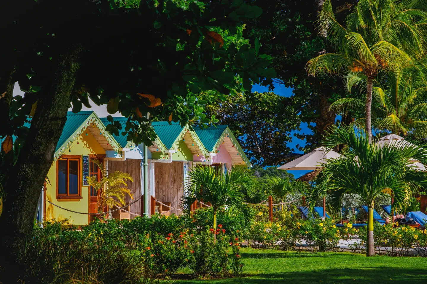 Colorful cottages and tropical gardens at Bequia Beach Hotel.