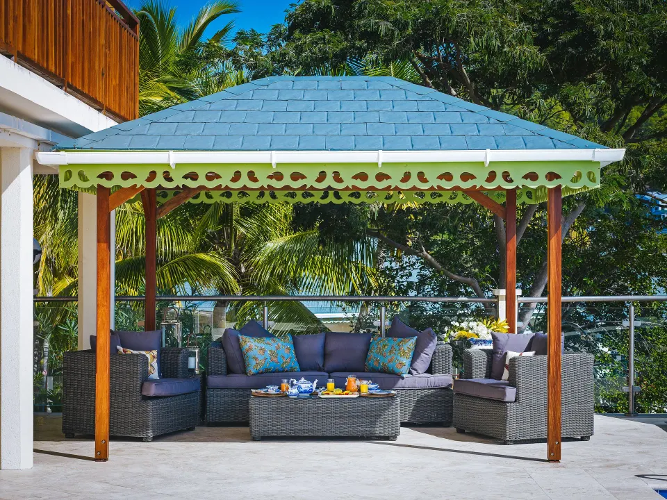 Grand Villa terrace gazebo with outdoor lounge seating at Bequia Beach Hotel.
